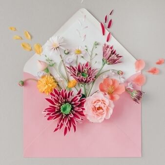 Envelope flowers pink self love gift reward 600 338