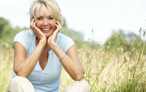 Middle aged women sitting in rural setting 600 400