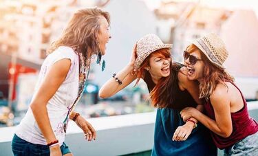 3 girls talking and laughing