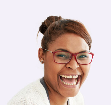 Young woman with glasses big smile