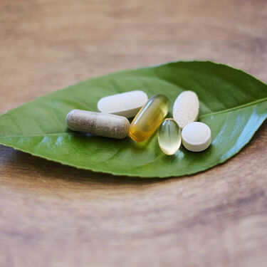 Pills capsules on leaf