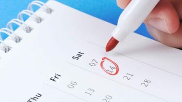 A pen circling a date on a calendar