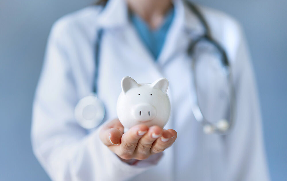 Financial health doctor holding piggy bank