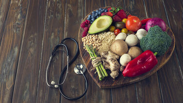stethoscope w/ fruit & vegetables heart-shaped platter