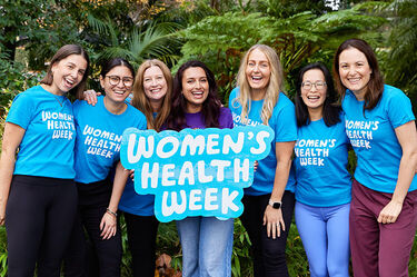 A group of women with a Women's Health Week sign